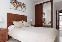 A bed or beds in a room at Apartamento Atenea centro con garaje gratuito