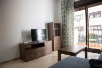 A television and/or entertainment centre at Apartamento Atenea centro con garaje gratuito