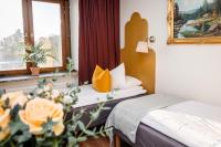 Postel nebo postele na pokoji v ubytování Hotel Lysekil
