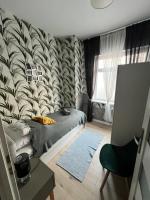 Posteľ alebo postele v izbe v ubytovaní Apartamenty Cieplicka 20a