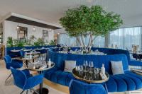 Χώρος καθιστικού στο GOLDEN TULIP LYON OUEST TECHLID Hotel & Spa