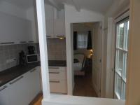 Kuchyň nebo kuchyňský kout v ubytování Luxe Appartement Duinoord