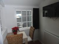 TV a/nebo společenská místnost v ubytování Luxe Appartement Duinoord