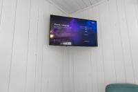 TV&#47;Unterhaltungsangebot in der Unterkunft Cozy Beachside Bungalow Studio Ideal for Couples