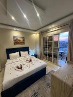 Postel nebo postele na pokoji v ubytování Pyramids Haven Hotel