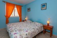 Posteľ alebo postele v izbe v ubytovaní Apartment near the beach with a huge terrace patio, wifi and parking