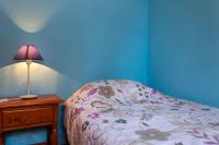 Posteľ alebo postele v izbe v ubytovaní Apartment near the beach with a huge terrace patio, wifi and parking
