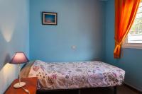 Posteľ alebo postele v izbe v ubytovaní Apartment near the beach with a huge terrace patio, wifi and parking