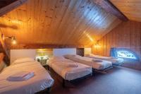Posteľ alebo postele v izbe v ubytovaní Chalet La Chapelle aux pieds des pistes