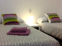 Postel nebo postele na pokoji v ubytování Lets Holidays Apartment Barcelona near beach