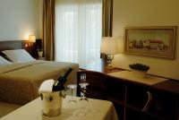 Łóżko lub łóżka w pokoju w obiekcie Hotel Villa Vera