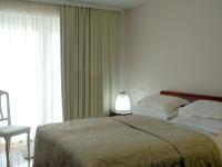 Łóżko lub łóżka w pokoju w obiekcie Hotel Villa Vera