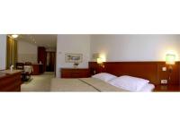 Łóżko lub łóżka w pokoju w obiekcie Hotel Villa Vera