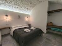 Posteľ alebo postele v izbe v ubytovaní La Madriguera Eco Caves