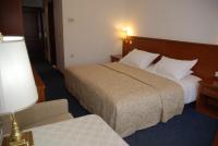 Łóżko lub łóżka w pokoju w obiekcie Hotel Villa Vera