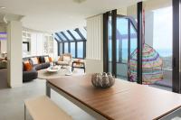 a living room with a couch and a table at Renaissance Santo Domingo Jaragua Hotel & Casino in Santo Domingo