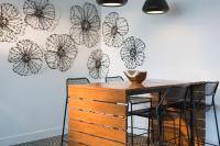 a dining room with black and white butterflies on the wall at Renaissance Santo Domingo Jaragua Hotel & Casino in Santo Domingo