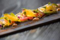 a plate of food with vegetables on a table at Renaissance Santo Domingo Jaragua Hotel & Casino in Santo Domingo