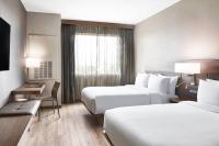 AC Hotel by Marriott Miami Airport West/Doralにあるベッド
