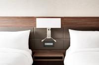 AC Hotel by Marriott Miami Airport West/Doralにあるベッド
