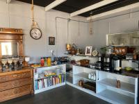 Η κουζίνα ή μικρή κουζίνα στο WANNAQUEROS SUITES