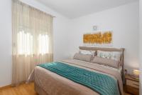 Posteľ alebo postele v izbe v ubytovaní Apartment Njivice 5295b