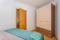Posteľ alebo postele v izbe v ubytovaní Apartment Njivice 5295b
