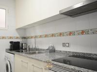 A kitchen or kitchenette at Cozy apartment in downtown area