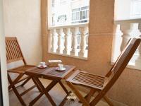 A balcony or terrace at Cozy apartment in downtown area