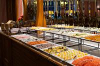 a buffet line with many different types of food at Aries Hotel & SPA Wisła in Wisła