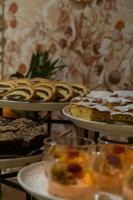 a bunch of different types of cakes and pies at Aries Hotel & SPA Wisła in Wisła