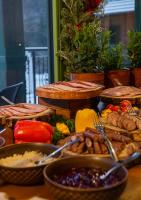 a table topped with lots of different types of food at Aries Hotel & SPA Wisła in Wisła