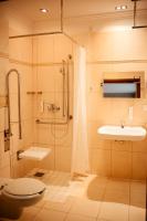 Kúpeľňa v ubytovaní Hotel Kuracyjny Spa & Wellness