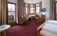 Posteľ alebo postele v izbe v ubytovaní Gästehaus Brantlhof Zimmer und Ferienwohnungen in Going am Wilden Kaiser