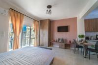 Łóżko lub łóżka w pokoju w obiekcie Bill Apartments