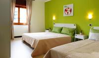 A bed or beds in a room at B&B Business Vacanze