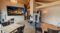 A television and/or entertainment centre at alpen select lodge Kleinwalsertal