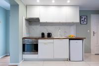 Kuchyňa alebo kuchynka v ubytovaní 7apartments przy Termach Cieplickich