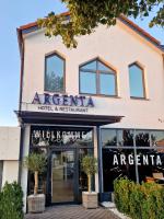 a building with a sign that reads argentinian hotel and restaurant at ARGENTA Living 129 in Künzell