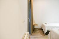 Postel nebo postele na pokoji v ubytování Ganganell Centre Apartamento con Patio