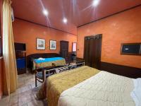 Posteľ alebo postele v izbe v ubytovaní Hotel Villa Elisabetta