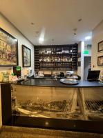 a bar in a restaurant with a counter top at Suite Hotel Aeroporto Congonhas UH117 in Sao Paulo