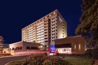 a hotel building with a sign in front of it at Fairfield Inn &amp; Suites by Marriott Charlotte Uptown in Charlotte