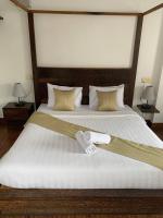Suite Home Boutique Hotelにあるベッド