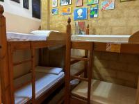 Postel nebo postele na pokoji v ubytování DORMERO Albergue San Miguel Hospital de Órbigo