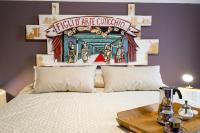 A bed or beds in a room at Cassari UpArtments