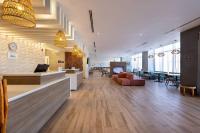 Residence Inn by Marriott Cancun Hotel Zoneにあるテレビまたはエンターテインメントセンター