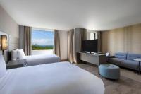 Residence Inn by Marriott Cancun Hotel Zoneにあるベッド