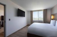Residence Inn by Marriott Cancun Hotel Zoneにあるベッド