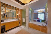 a bathroom with a tub and a sink and a shower at ITC Grand Chola, a Luxury Collection Hotel, Chennai in Chennai